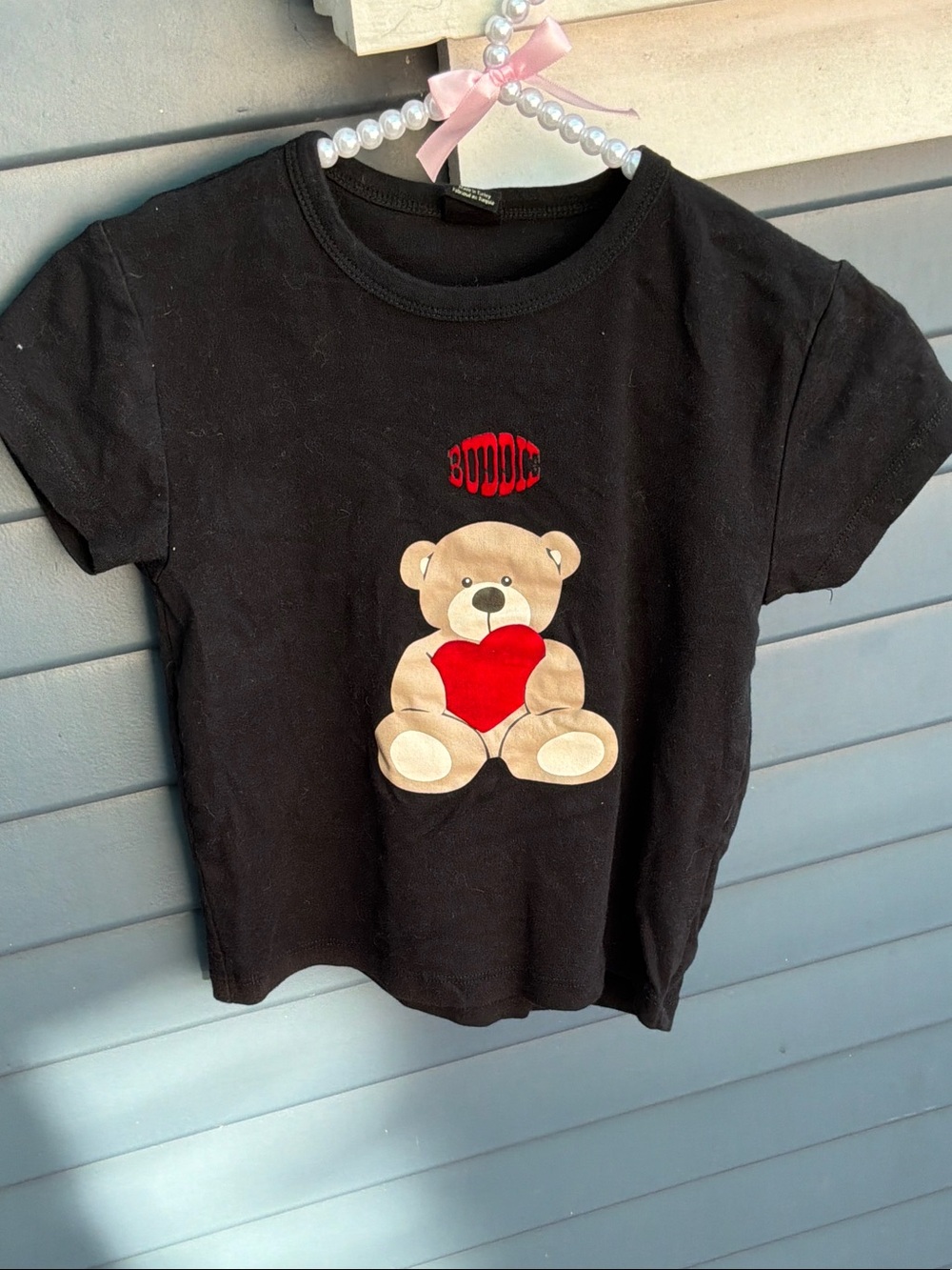 Woman’s Urban Outfitters Tee with Teddy Holding Red Heart